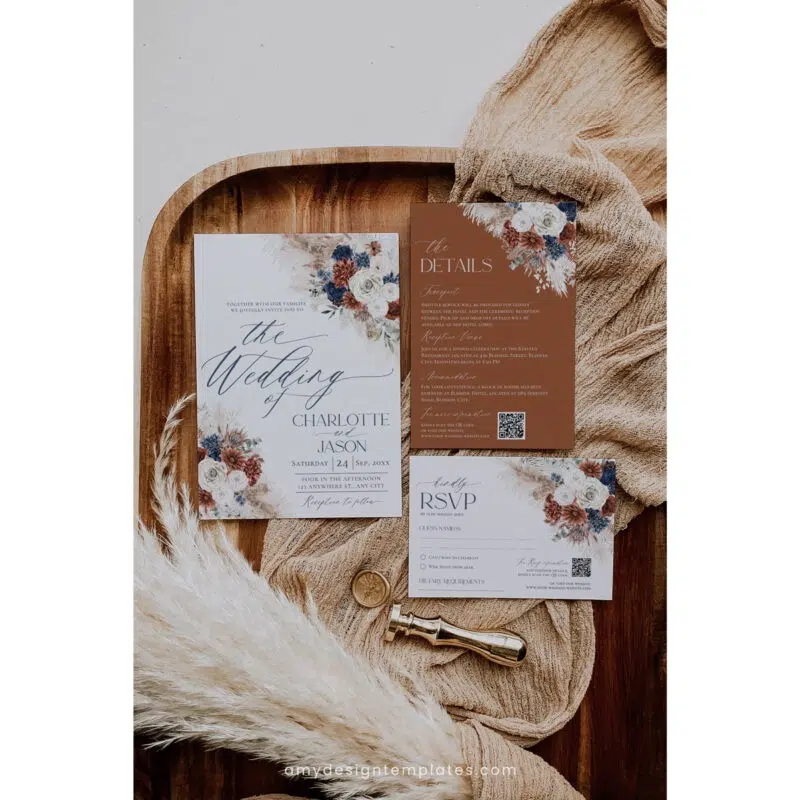 Editable navy blue and rust wedding invitation card set with pampas grass and boho floral accents, perfect for fall weddings and rustic themes.