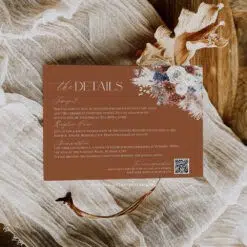 Boho enclosure RSVP card template in navy blue and rust with elegant pampas grass and floral elements, fully customizable for weddings.