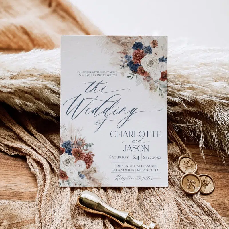 Editable navy blue and rust wedding invitation card set with pampas grass and boho floral accents, perfect for fall weddings and rustic themes.