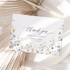 Botanical wildflower wedding thank you card with soft floral frames, greenery accents, and a rustic boho garden vibe, editable and printable.
