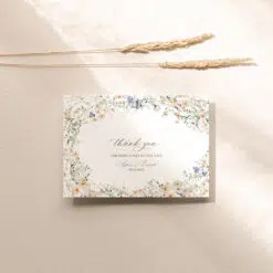 Wildflower wedding invitation suite template featuring colorful hand-drawn florals. Editable and printable for rustic or garden-themed weddings.