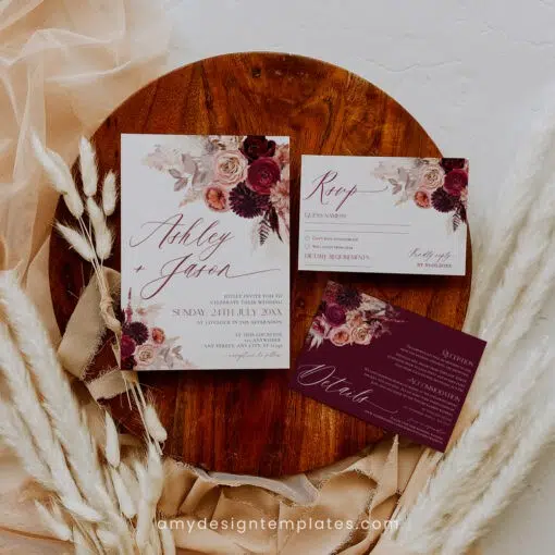 Boho burgundy wedding invitation suite with pampas grass, floral accents, and elegant rustic design – editable and printable for weddings.