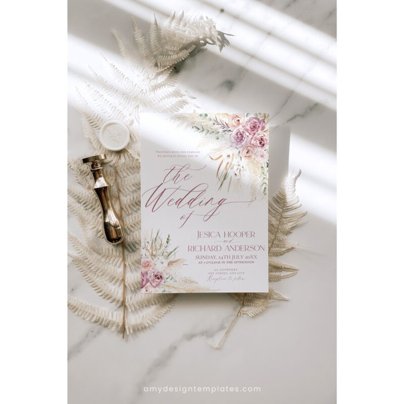 Editable boho pink wedding invitation card with modern typography and floral boho elements in soft blush tones
