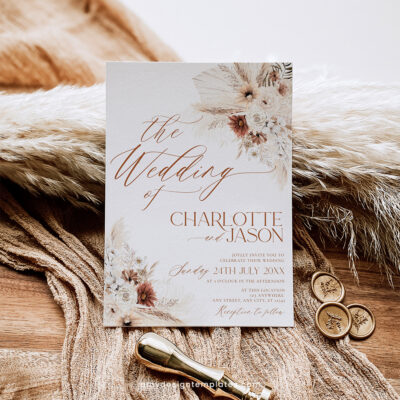 Terracotta wedding invitation template with earthy tones, and boho floral elements, fully editable and printable design.