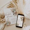 Boho bridal shower invitation featuring watercolor pampas grass and dried flowers with terracotta script text that reads Bridal Shower