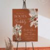 Boots and Bubbly Terracotta Western Bridal Shower Welcome Sign Template | Printable Cowgirl Boot Champagne Glass Pampas Grass Board | Editable Terracotta Vertical Entrance Display Boots and Bubbly Terracotta Western Bridal Shower Welcome Sign Template | Printable Cowgirl Boot Champagne Glass Pampas Grass Board | Editable Terracotta Vertical Entrance Display