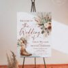 Western Boho Country Botanical Wedding Welcome Sign Template | Printable Cowgirl Boot White Dried Rose Pampas Grass Board | Editable White Vertical Entrance Display Western Boho Country Botanical Wedding Welcome Sign Template | Printable Cowgirl Boot White Dried Rose Pampas Grass Board | Editable White Vertical Entrance Display