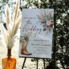 Western Boho Country Botanical Wedding Welcome Sign Template | Printable Cowgirl Boot White Dried Rose Pampas Grass Board | Editable White Vertical Entrance Display Western Boho Country Botanical Wedding Welcome Sign Template | Printable Cowgirl Boot White Dried Rose Pampas Grass Board | Editable White Vertical Entrance Display
