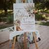Western Boho Country Botanical Wedding Welcome Sign Template | Printable Cowgirl Boot White Dried Rose Pampas Grass Board | Editable White Vertical Entrance Display Western Boho Country Botanical Wedding Welcome Sign Template | Printable Cowgirl Boot White Dried Rose Pampas Grass Board | Editable White Vertical Entrance Display